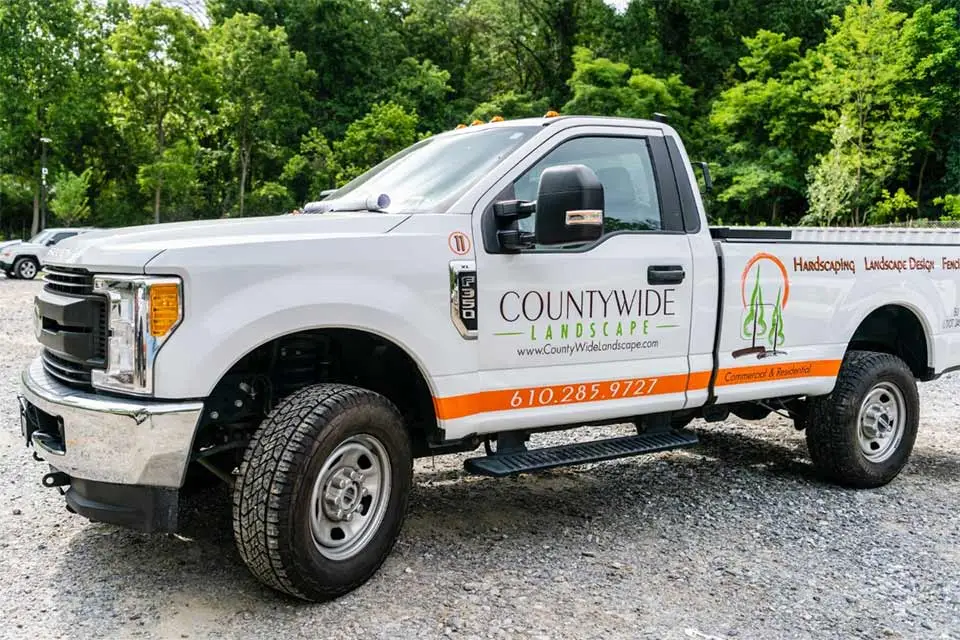 Countywide Landscape work truck with branding designs.