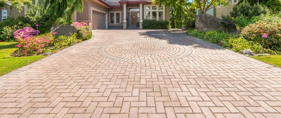 Beautiful paver driveway in West Chester, PA, with a herringbone pattern.