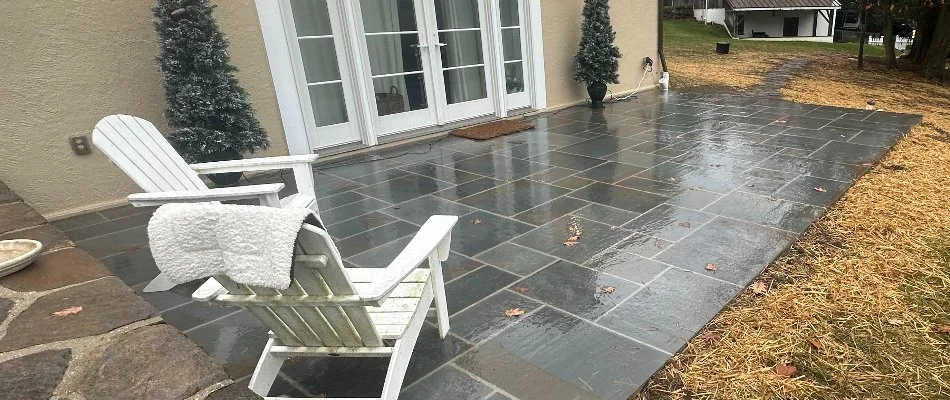 Bluestone patio in West Chester, PA, with lounge chairs.