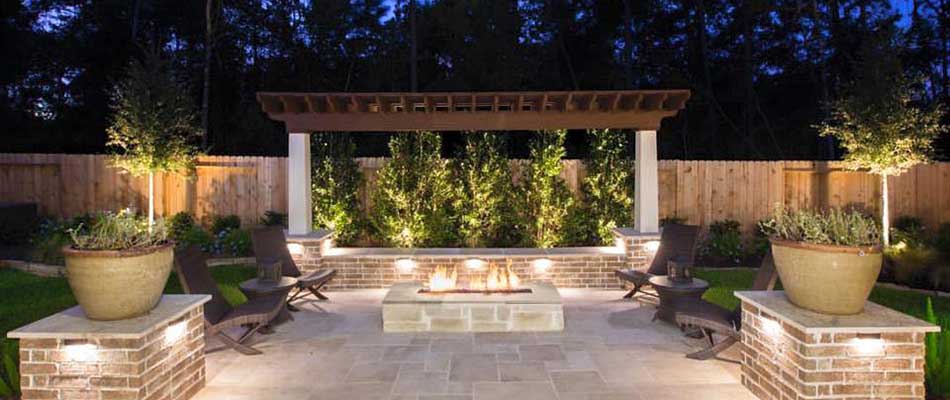 Custom fire pit, pergola, and patio at a home in Exton, PA.