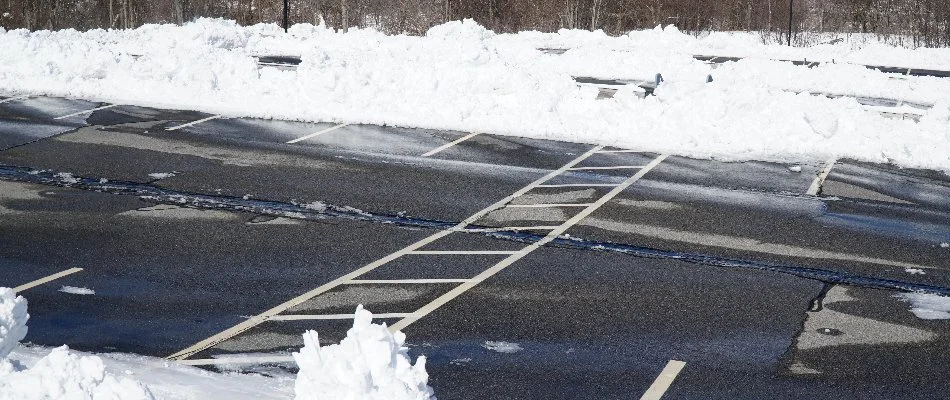 Parking lot in West Chester, PA, with snow cleared from the spaces.