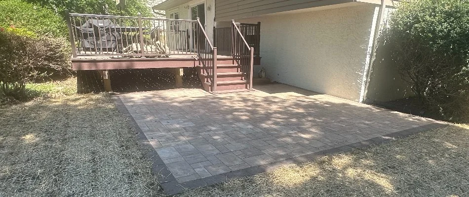 Back patio at the base of a wooden deck in Malvern, PA.