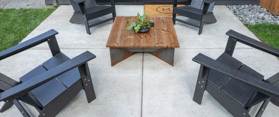 Plain concrete patio with chairs in West Chester, PA.