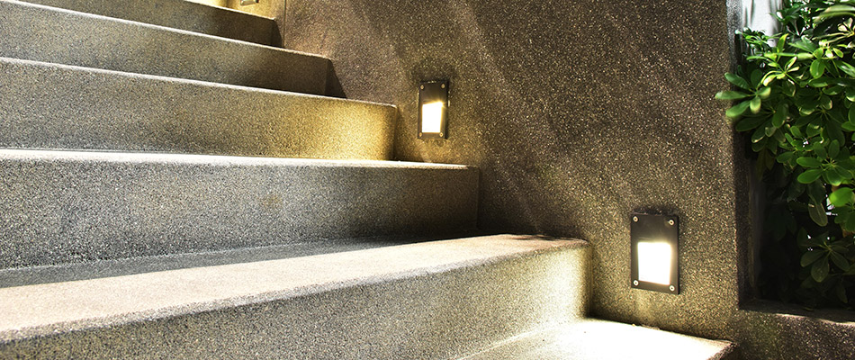 Concrete steps installed alongside LED lights behind a home in West Chester, PA. 