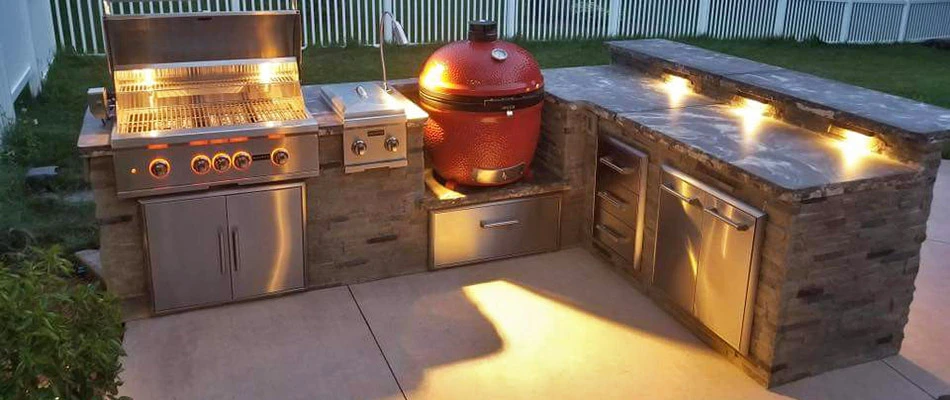 Custom outdoor kitchen with grill and countertops in West Chester, PA.