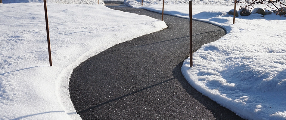 Snow removed from a path near a commercial lot in West Chester, PA.