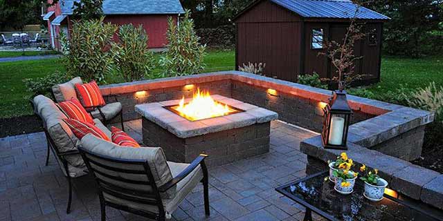 Custom fire pit design and retaining wall near West Chester, Pennsylvania.